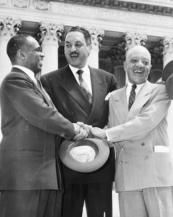 Picture on right: George E.C. Hayes, Thurgood Marshall, and James Nabrit, congratulating each other, following Supreme Court decision declaring segregation unconstitutional. 